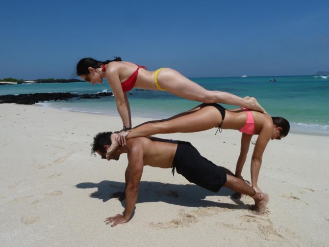 12172324-triple-yoga-on-the-beach.jpg